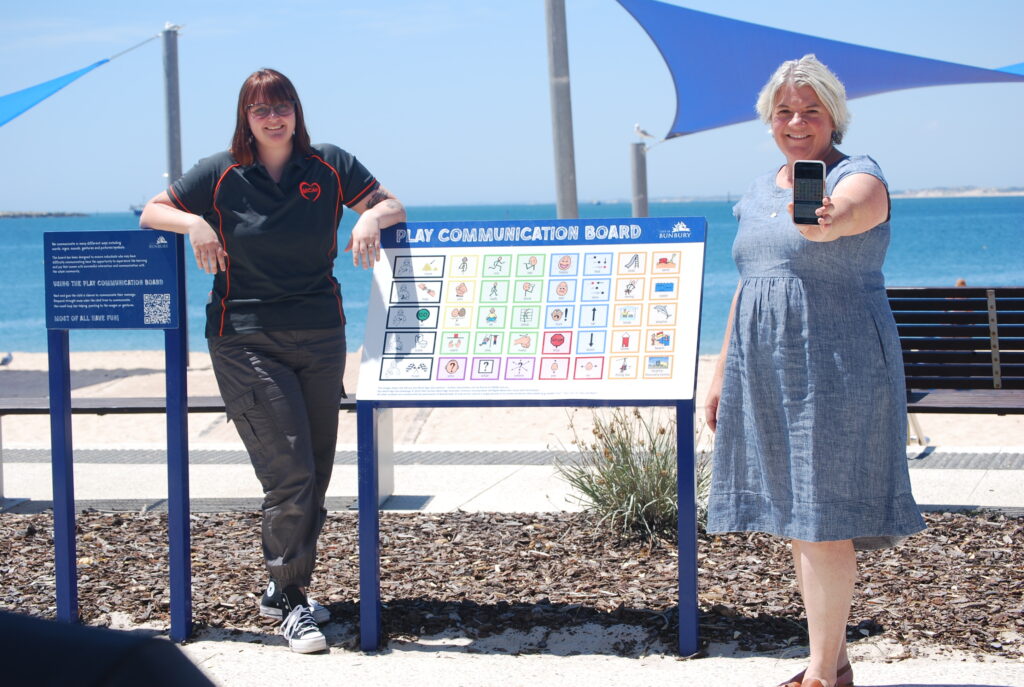 Communication boards at Koombana Bay pictured with the creators making family-friendly events more accessible.