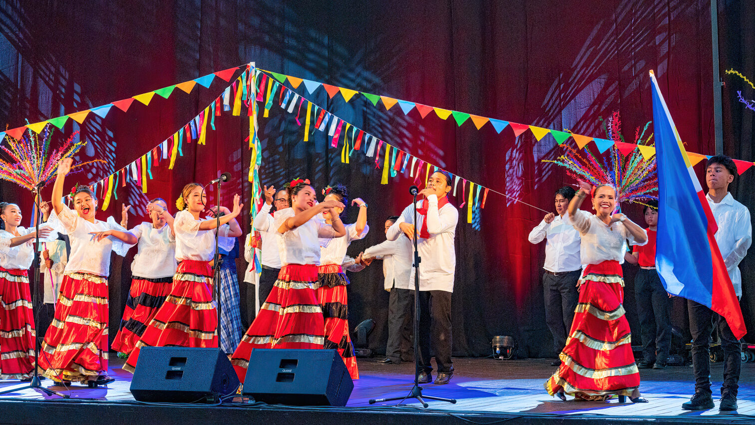 South West Multicultural performers on stage.