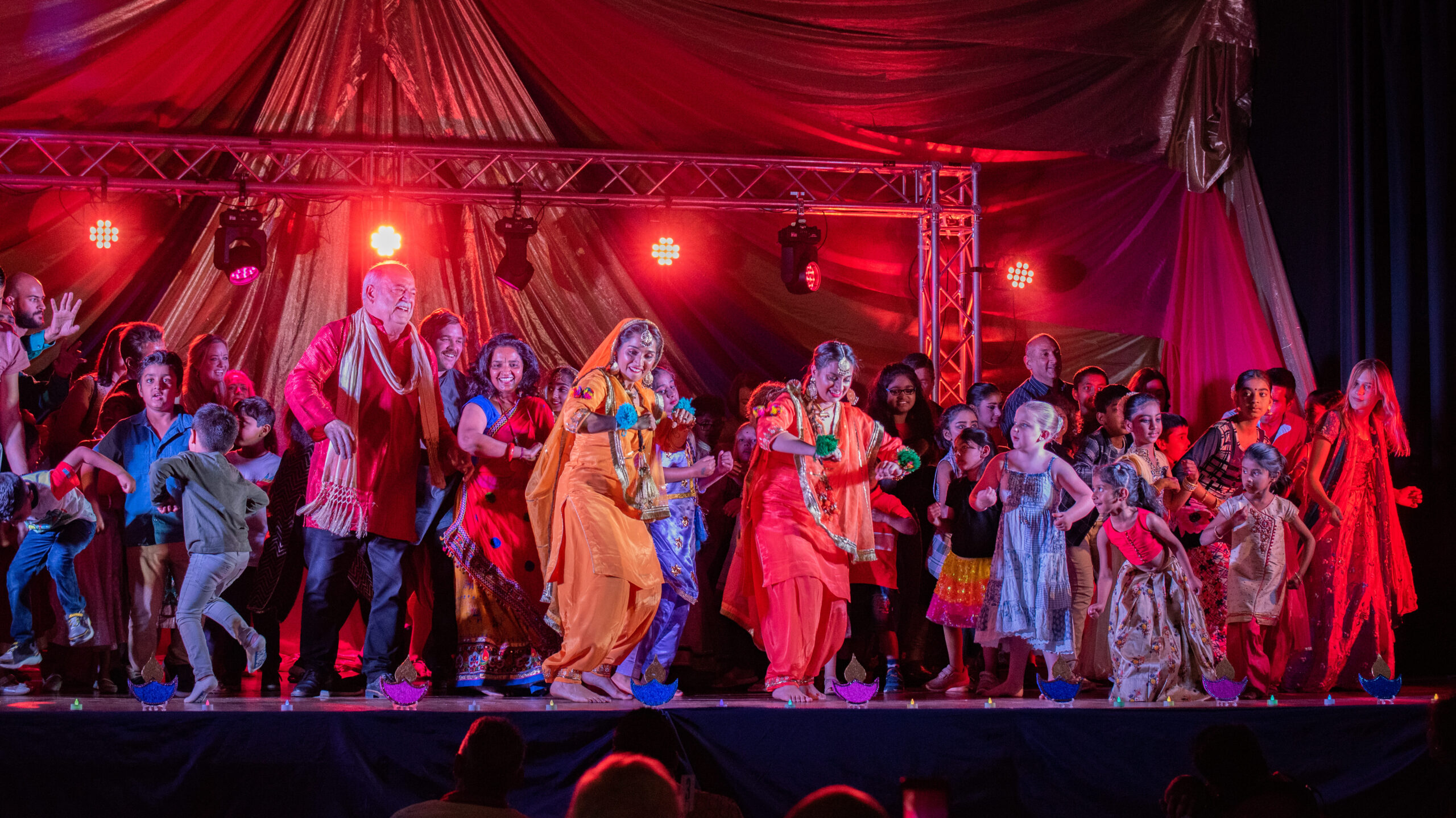 South West Indian Group Diwali Festival of Lights performers on stage.