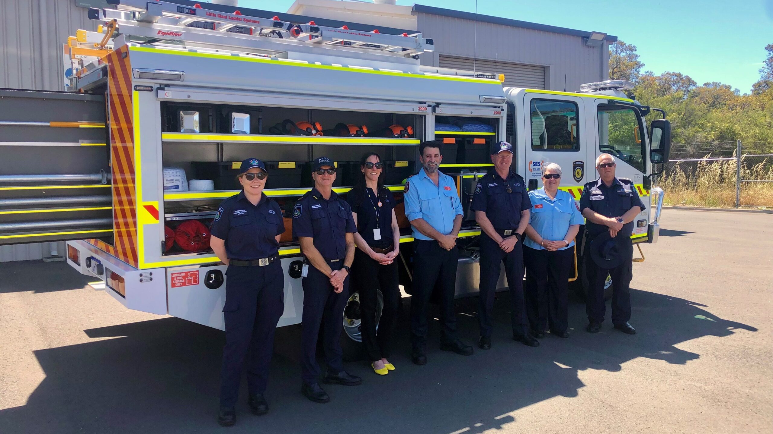 Emergency team in front of fire truck